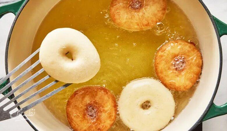چگونه دونات خانگی درست کنیم ؟طرز تهیه دونات خانگی نرم و پفدار با روکش شکلاتی